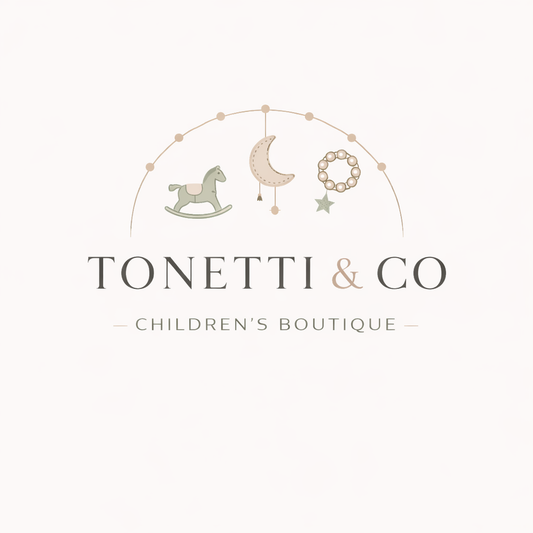 Logo for Tonetti & Co Children's Boutique featuring baby items on a light background
